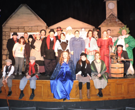 A picture of the cast of A Christmas Carol